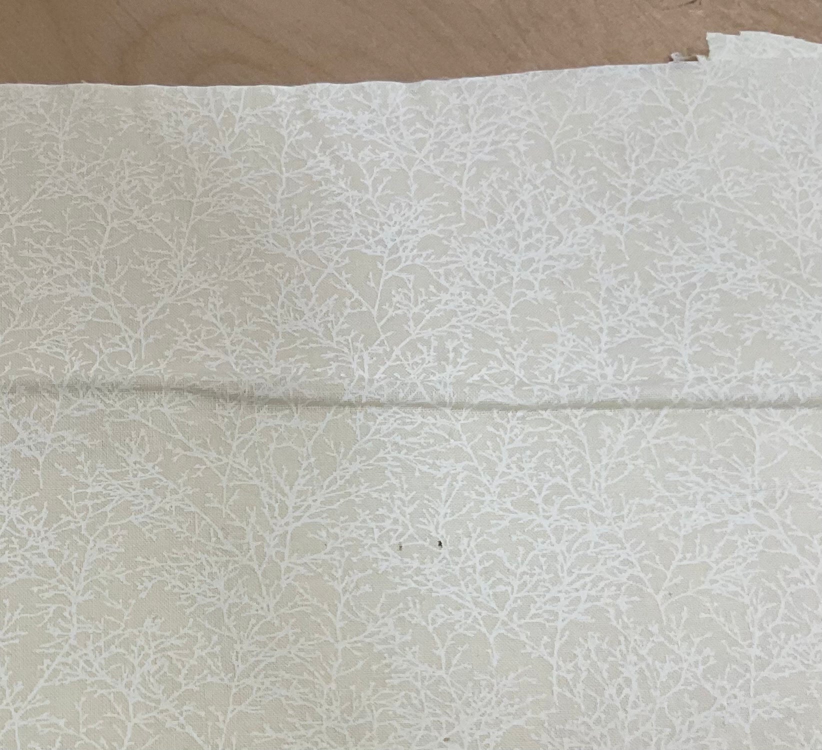 REMNANT  - (FLAWED) 50cm branches on ecru quilting cotton