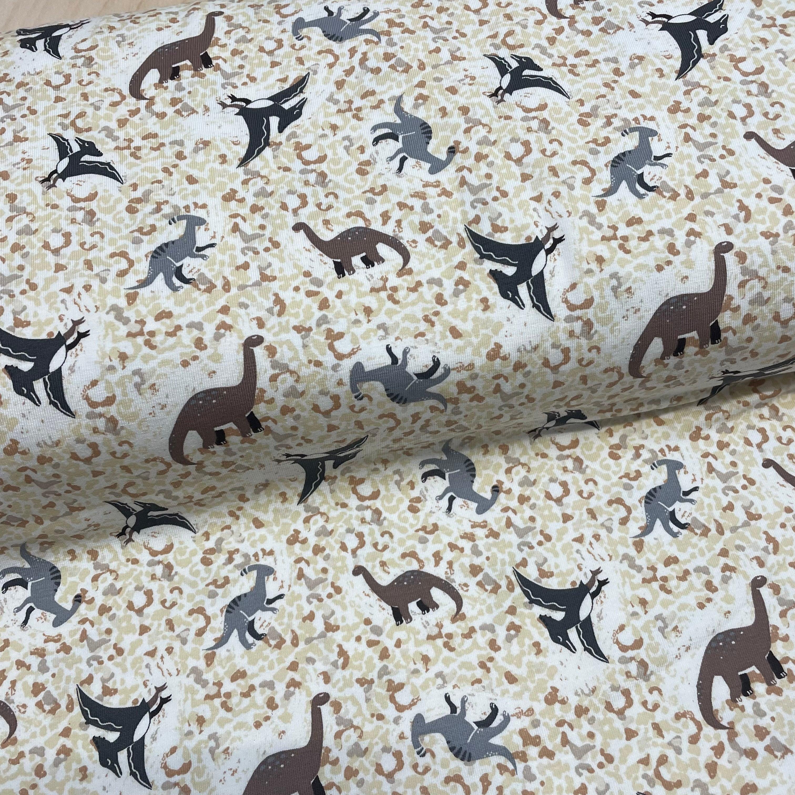 Small Dinosaurs on Sand texture Cotton Jersey Fabric