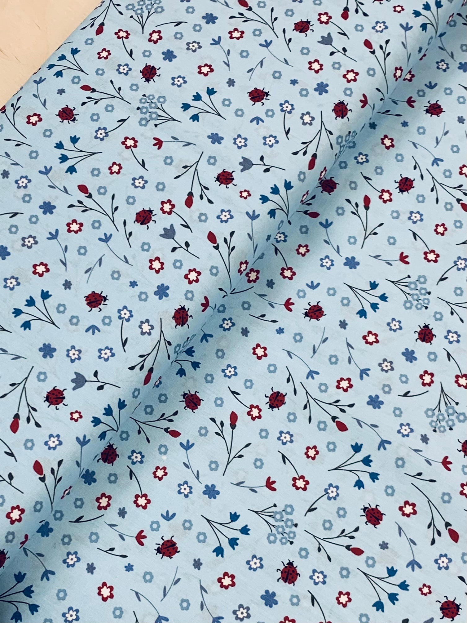 Lady Birds and Forget-Me-Nots Blue Cotton Poplin