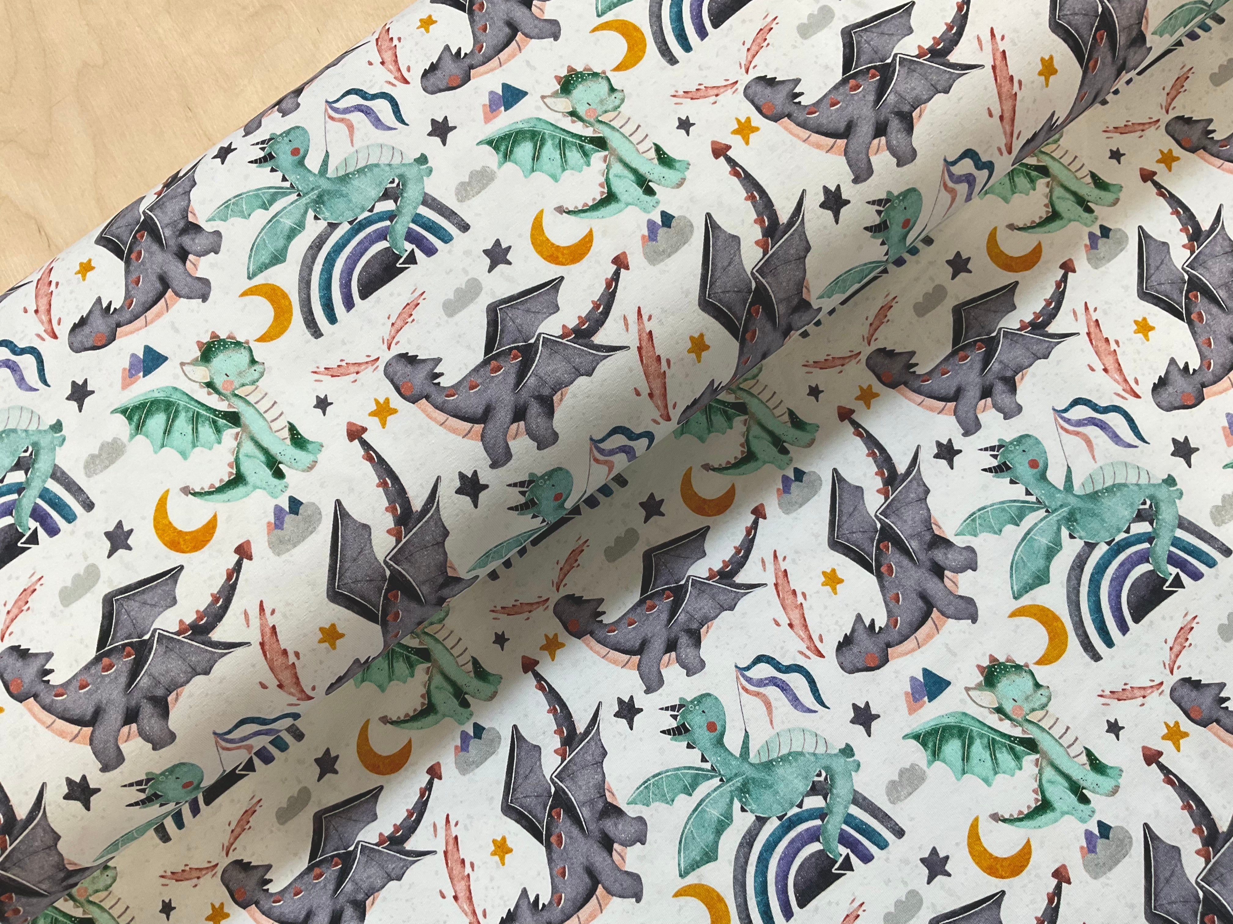 Cute Dragons on white Cotton Jersey Fabric