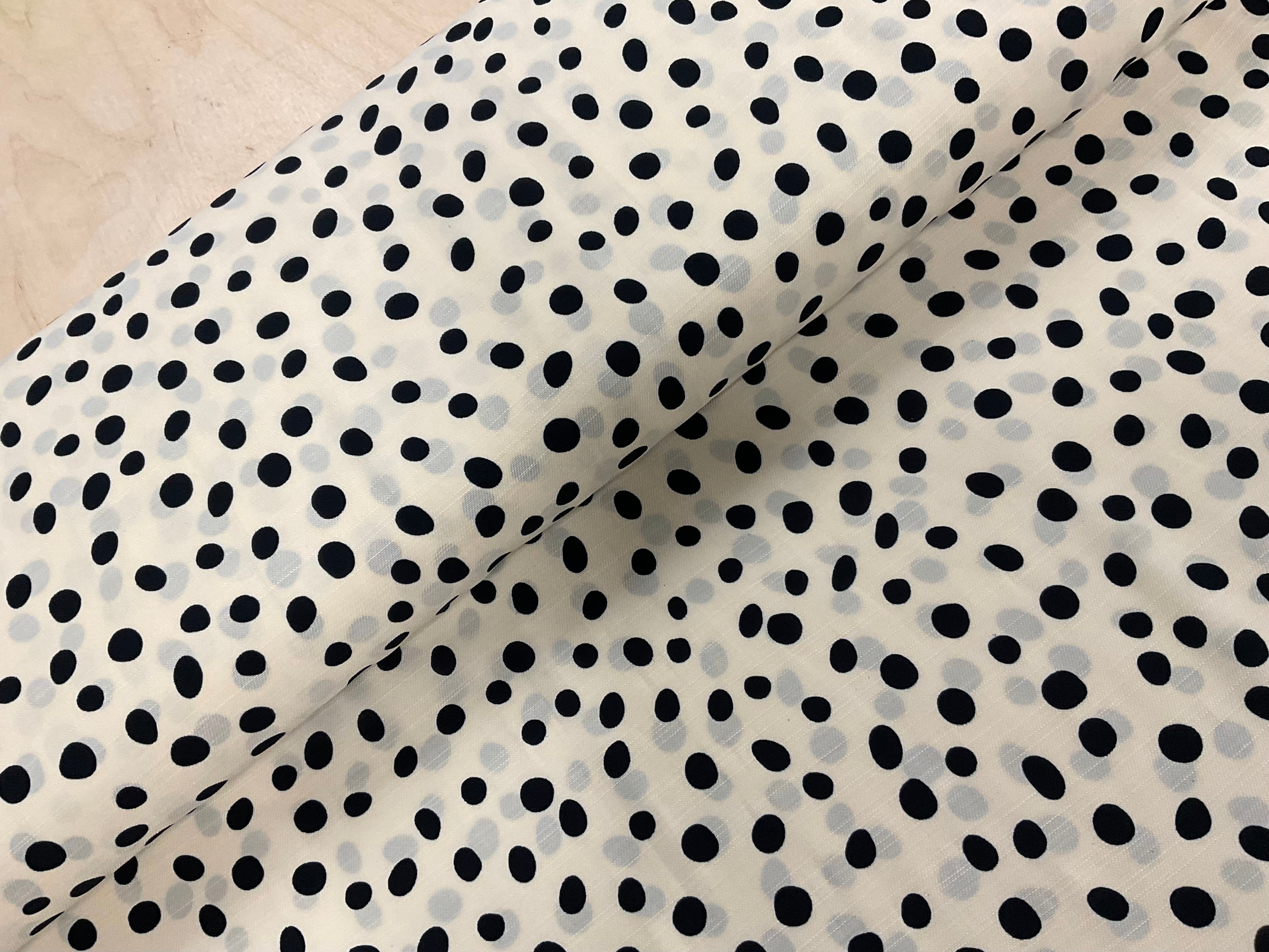 Black Spot on Cream Fabric
