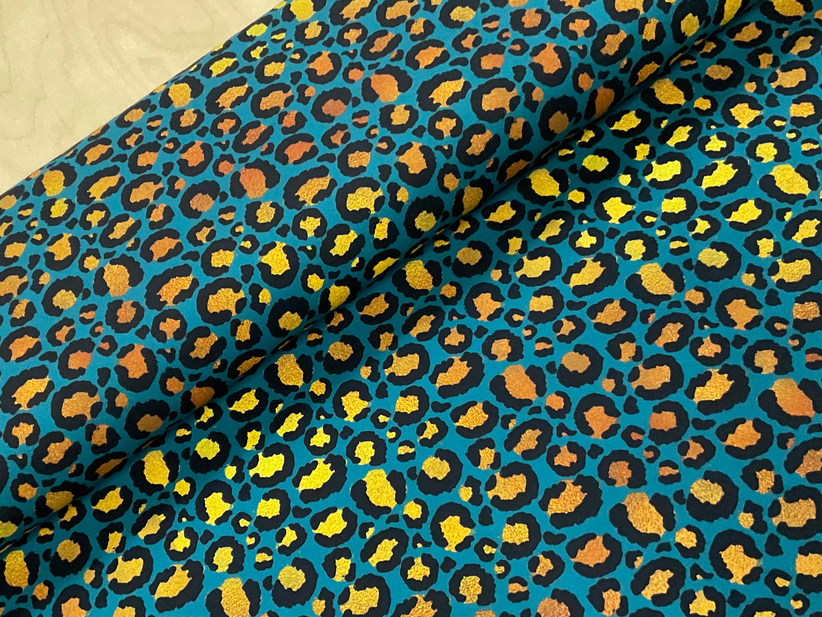 Green and Gold Leopard Brushed Athletic Fabric