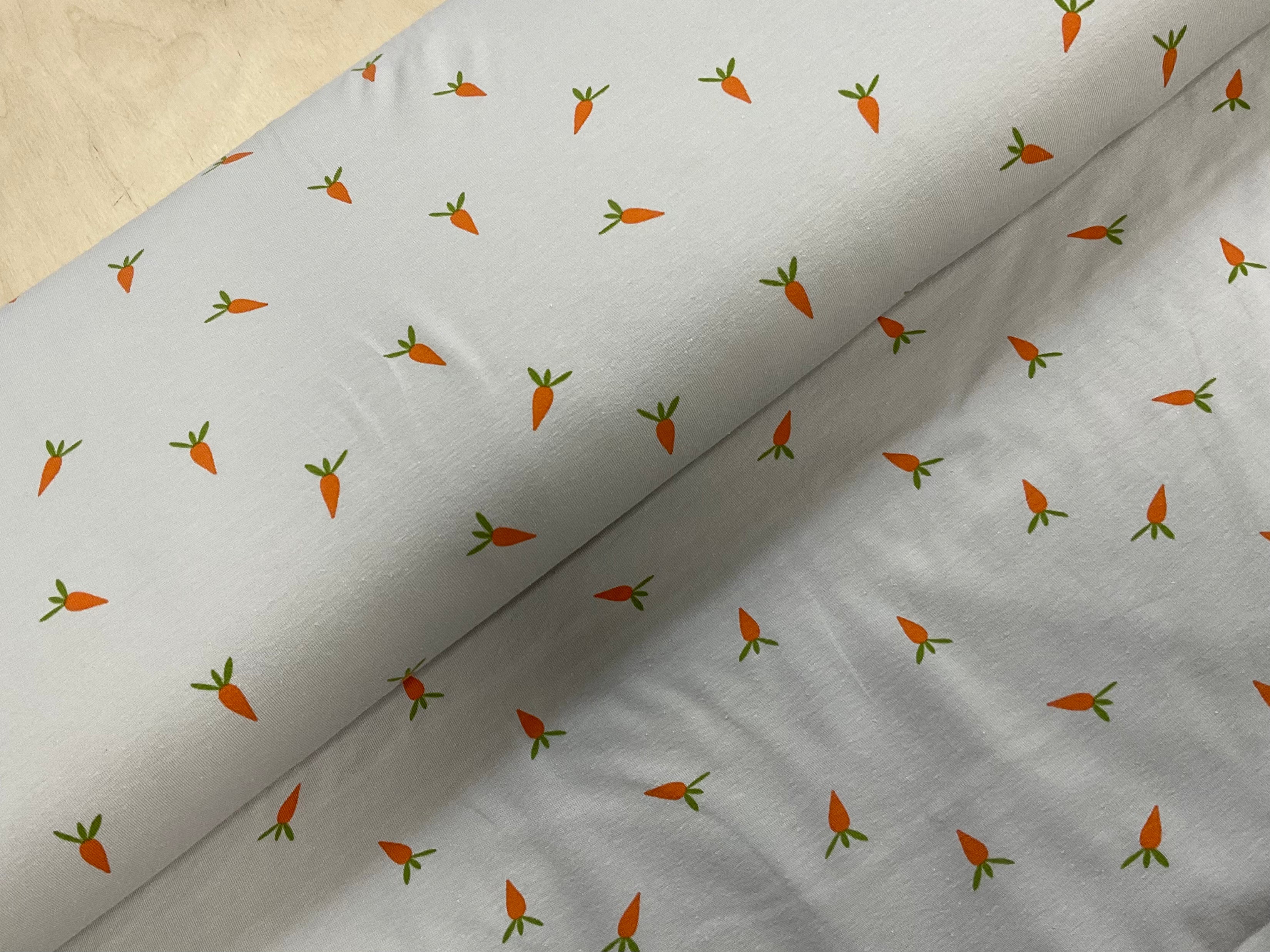 Carrots on Grey Cotton Jersey Fabric