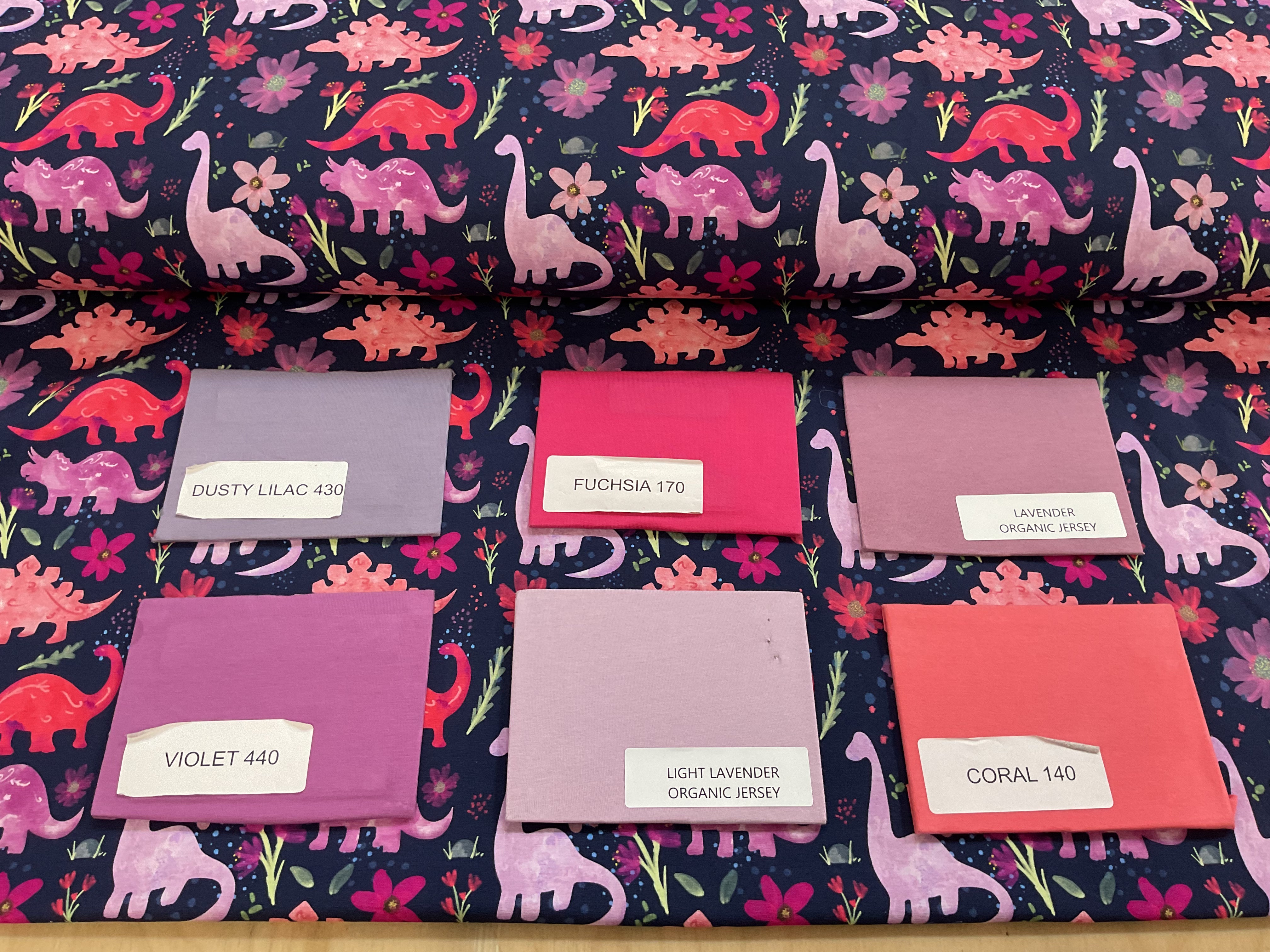 Pink Dinosaur Flowers on Navy Cotton Jersey Fabric