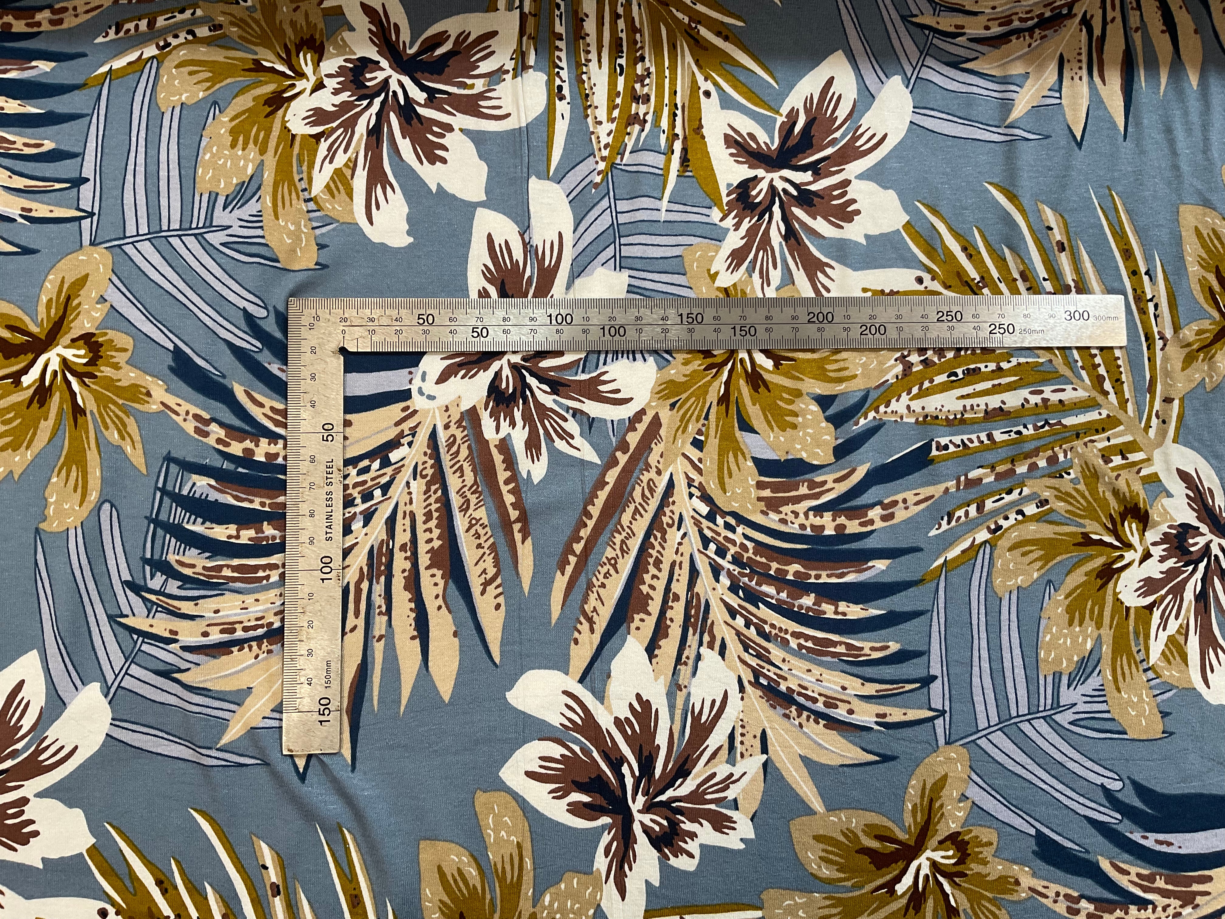 Tropical Leaves and Flowers on Dusty Blue Viscose Jersey