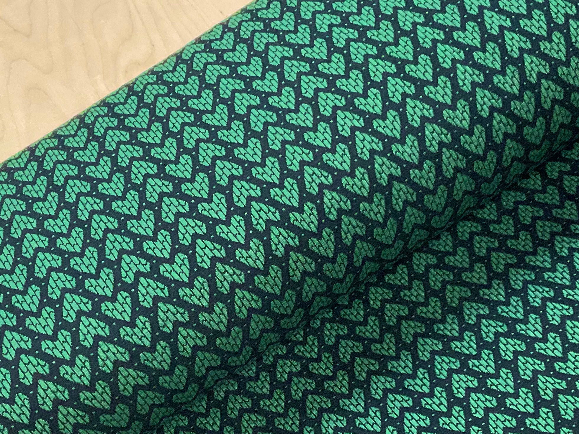 Green Hearts on Black Stretch Knit