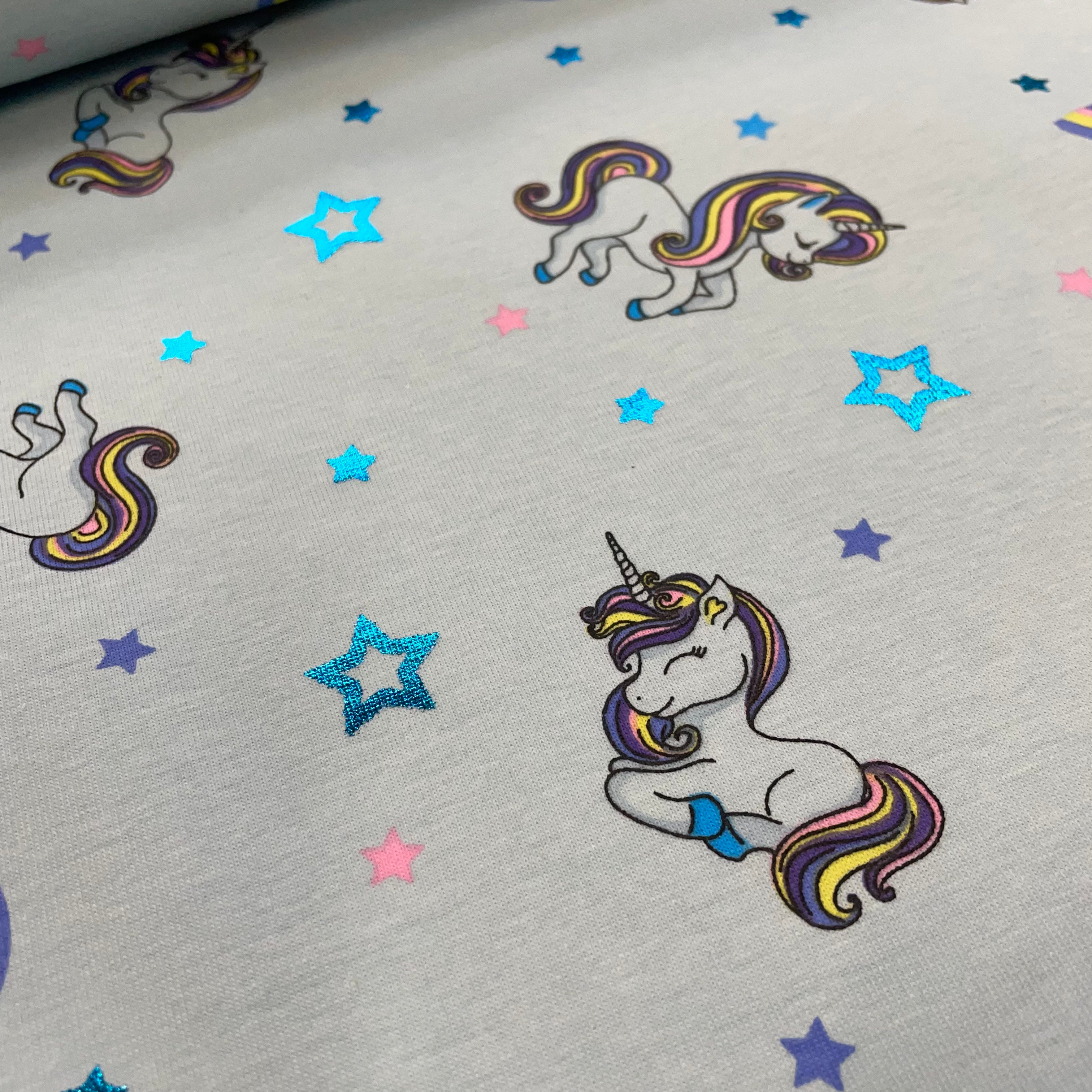 Unicorns with foil on blue Cotton Jersey Fabric