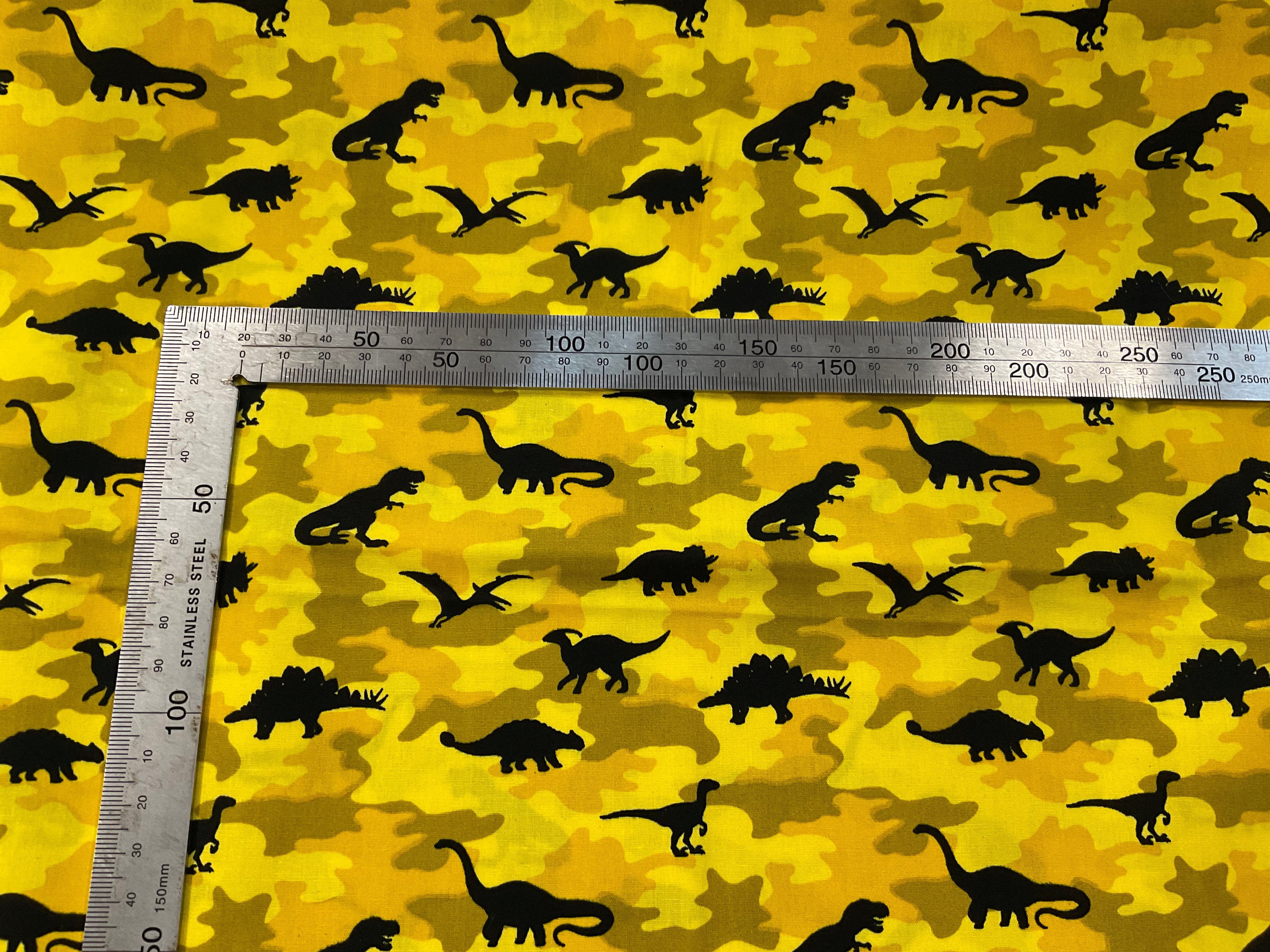Black Dinosaurs on Camouflage Cotton Poplin